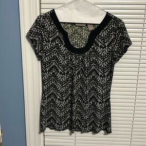 Small short-sleeve black/green/brown print blouse with scalloped black neckline